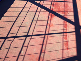 Abstract shadow of steel structure on the ground