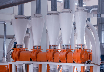 Plant for the production of food flour, a lot of metal pipes through which food flour passes,...