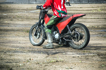 Obraz na płótnie Canvas Motoball, teens play motoball on motorcycles with a ball, motorcycling