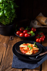 rustic Delicious Pasta - Ravioli in tomato sauce with basil
