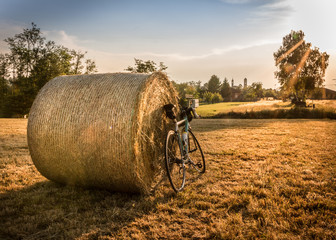 Bicycle in the countryside of Italy cycling at sunset 