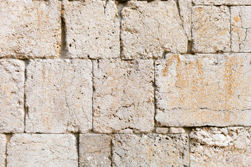 Texture of stone wall, medieval bricks background