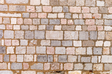 Texture of stone wall, medieval bricks background