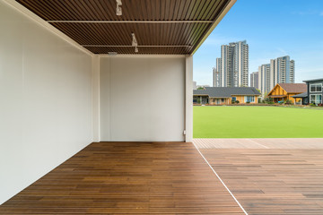 Green life, grassland and distant houses