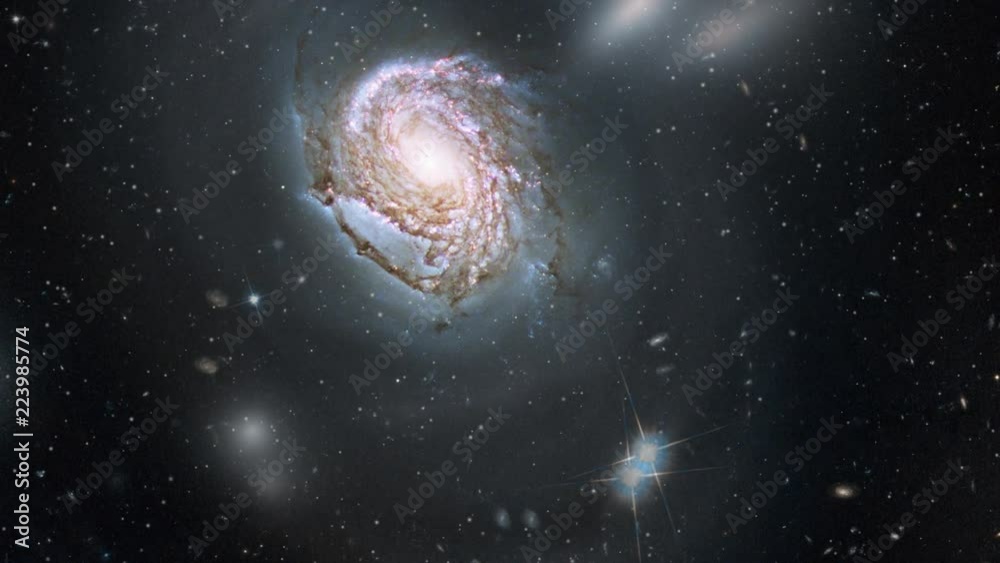 Wall mural spiral galaxy rotating in outer space on star field. contains public domain image by nasa