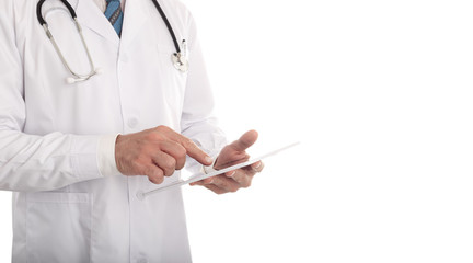 Close up of male doctor using tablet standing isolated over white
