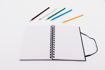 Open notepad with spring with two blank sheets