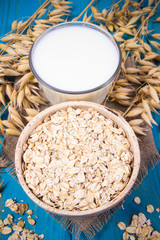 Oat and oat milk. Healthy breakfast, healthy eating concept.