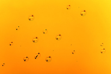 Soap bubbles on a golden background