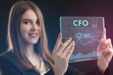 The concept of business, technology, the Internet and the network. A young entrepreneur working on a virtual screen of the future and sees the inscription: CFO