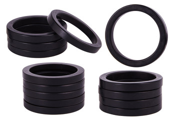 Set of black gaskets isolaled on white background. Oil seals for hydraulic cylinders for Industrial on white background. Oil Seals chemical resistant for Industrial