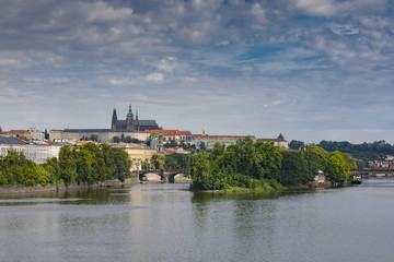 view of castle and charles bridge in prague