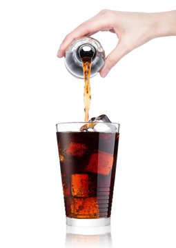 Female Hand Pouring Cola From Bottle To Glass