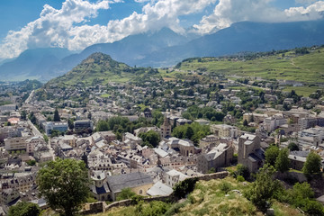Panorama over Sion, the capital of the Canton Valais in Switzerland. Photo was taken on the hills surrounding Sion on which two castles are located: the Tourbilllon.and Valere.