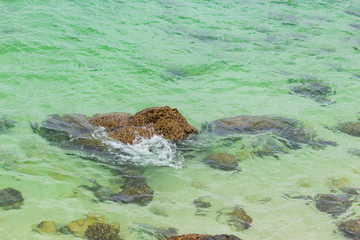Rocks and clear waters