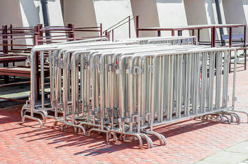 Aluminum fences, dismountable parts, stacked in a square