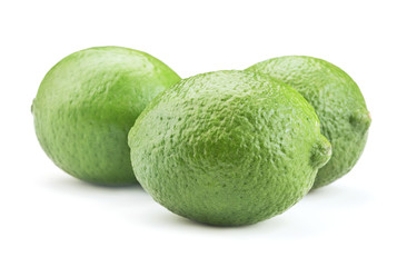 fresh ripe lime fruits isolated on white background