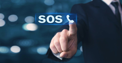 Man hand pressing phone tube icon. SOS