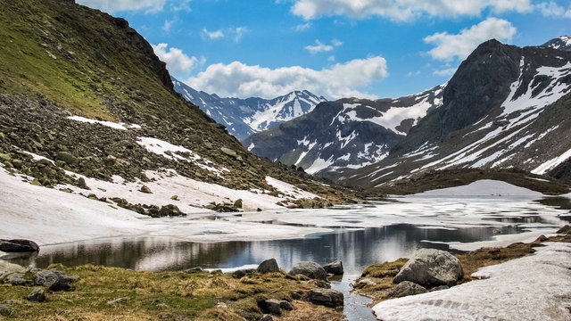 A look on a lake on the Fluela Pass in Graubunden, Switzerland. It is a high mountain pass in the Swiss Alps in the canton of Graub&uuml;nden. The road connects Davos and Susch in the lower Engadin valley.