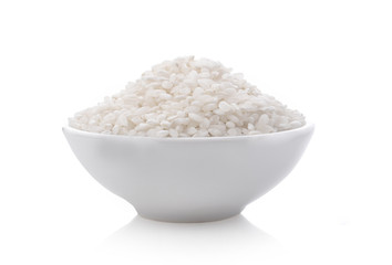 white rice in bowl on white background