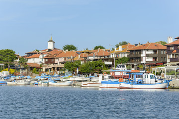 Fototapeta na wymiar City of nessebar with the port and fishing boat.