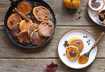 Pumpkin pancakes with chocolate chips fresh blueberry.  Overhead view