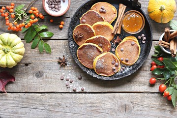 Pumpkin pancakes with chocolate chips fresh blueberry.  Overhead view