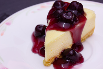 homemade blueberry new york cheesecake in plate.