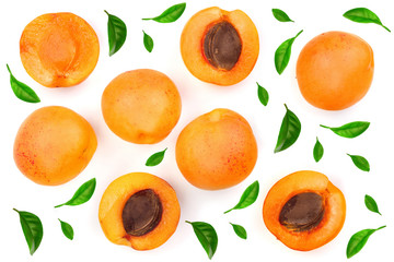 Apricot fruits with leaves isolated on white background. Top view. Flat lay pattern