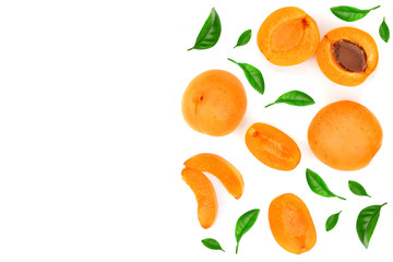 Apricot fruits with leaves isolated on white background with copy space for your text. Top view. Flat lay pattern