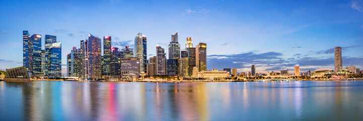 Naklejka na ściany i meble Singapore financial district skyline at Marina bay on twilight time, Singapore city, South east asia.