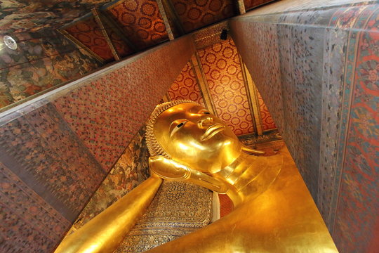 Wat Pho (the Temple of the Reclining Buddha), one of the largest temple complexes in the city and famed for its giant reclining Buddha that measures 46 metres long and is covered in gold leaf.