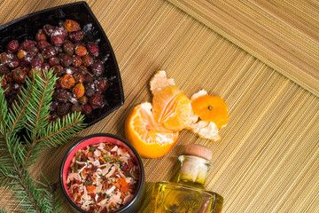 New Year's and Christmas. Decorative set of dog rose, mandarin, spruce branch. View from above