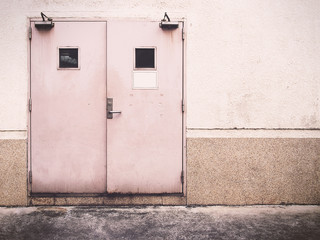 Grunge wall with twin door and dirty floor