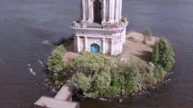 Famous flooded bell tower, Kalyazin Tver oblast Russia, aerial view. Beautiful St. Nicholas Cathedral, Kalyazin city. Flooded belfry is part of church. Abandoned ancient church in water of Volga River