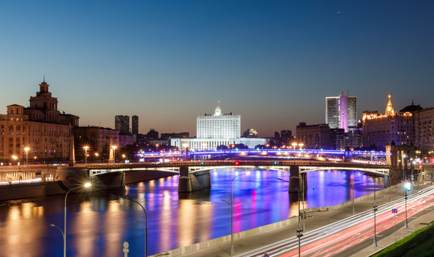 House of the government of the Russian Federation, beautiful Moscow river, night road and water traffic along the river and the embankment