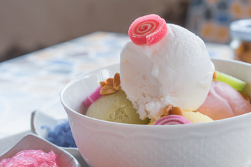 Ice cream in bowl and desserts.