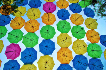 Fototapeta na wymiar Hanging Umbrellas above the walkway in Coral Gable, Florida