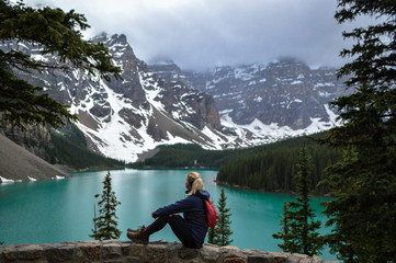 Woman looking at the Moraine lake