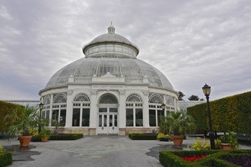 Fototapeta na wymiar The Bronx, NY, USA: The Enid A. Haupt Conservatory (1902), a greenhouse in the New York Botanical Garden, was modeled after the Palm House at the Royal Botanic Garden at Kew, England.