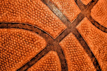 Tuinposter Orange basketball close-up texture © Olena