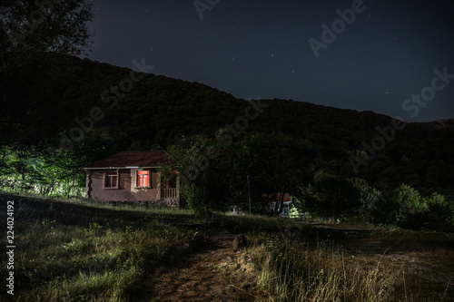 Mountain Night Landscape Of Building At Forest At Night With