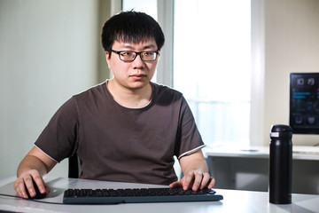 young man working with computer