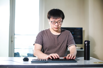 young man working with computer