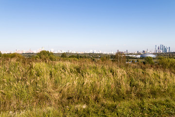 view of moscow with green field and blue sky