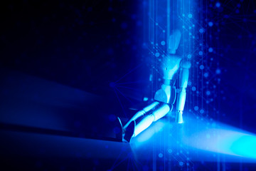 Obraz na płótnie Canvas wood pose for technology artificial intelligence robotic machine concept on blue light