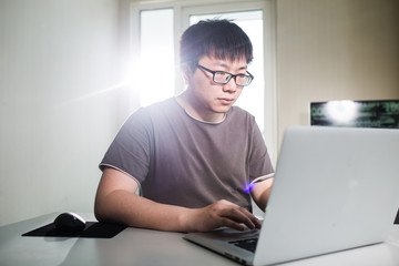 young man working with computer
