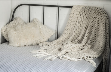 Bed in the apartment. Bedroom in studio apartment. © Aleks Kend