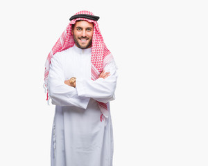 Young handsome man wearing keffiyeh over isolated background happy face smiling with crossed arms...
