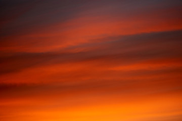 burning clouds in the evening sky after sunset